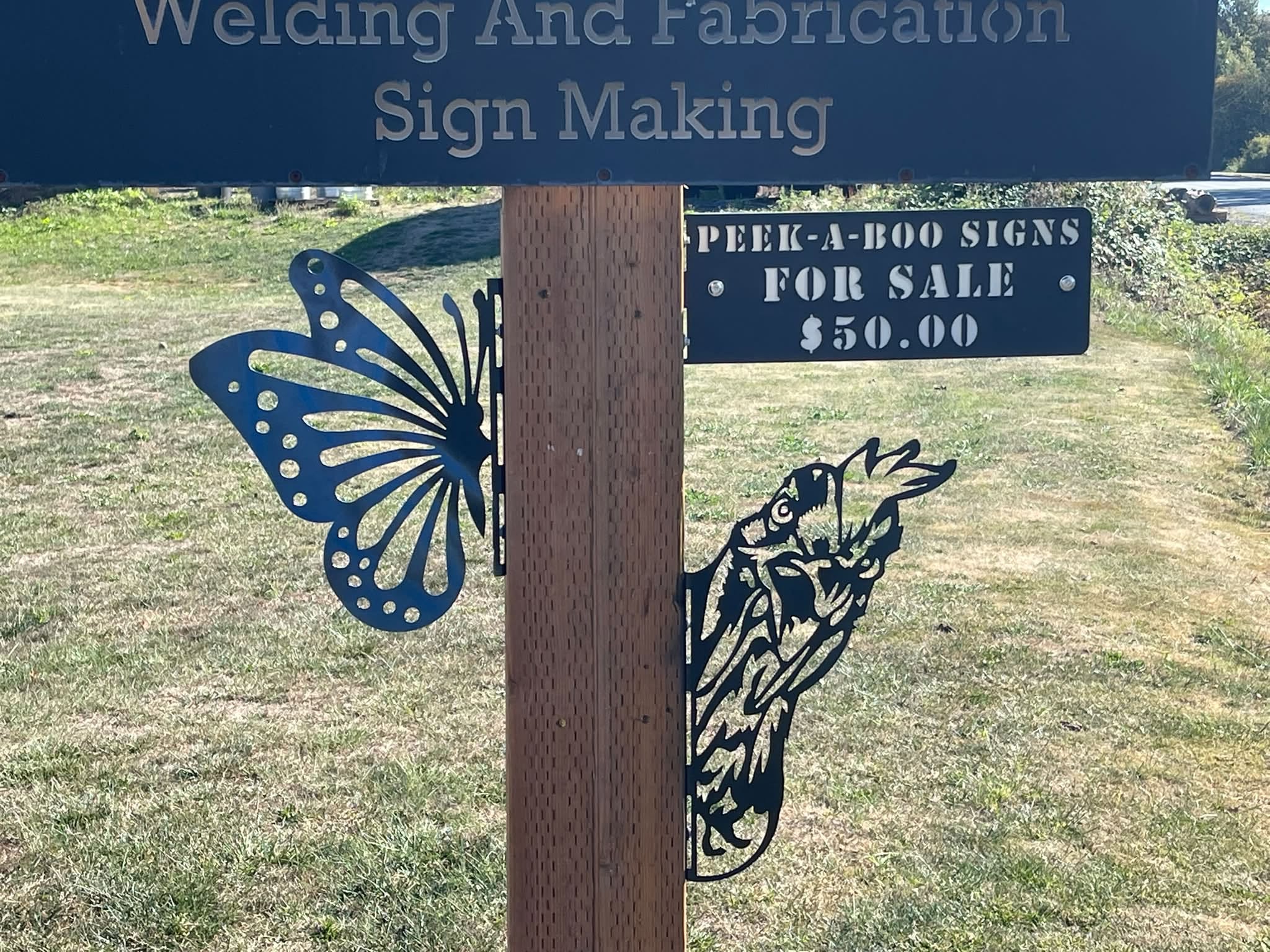 Butterfly and chicken peek-a-boo steel signs