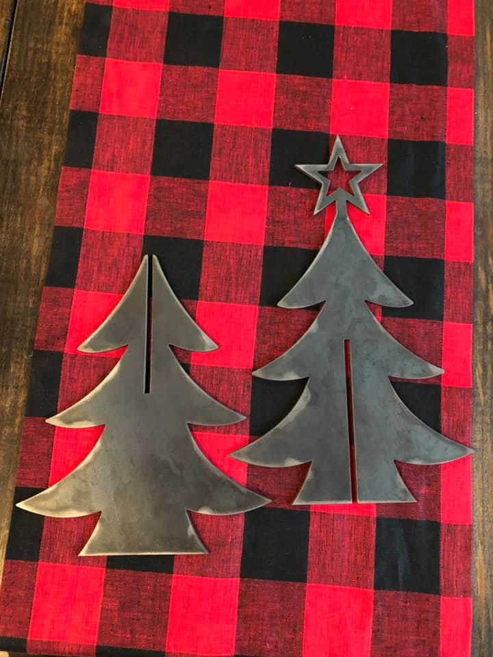 Freestanding steel Christmas tree with star topper